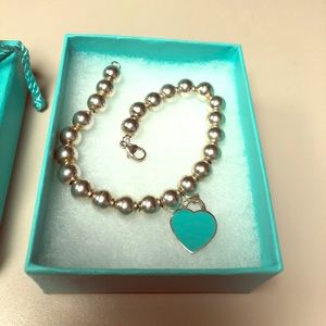 Tiffany’s bracelet with blue heart